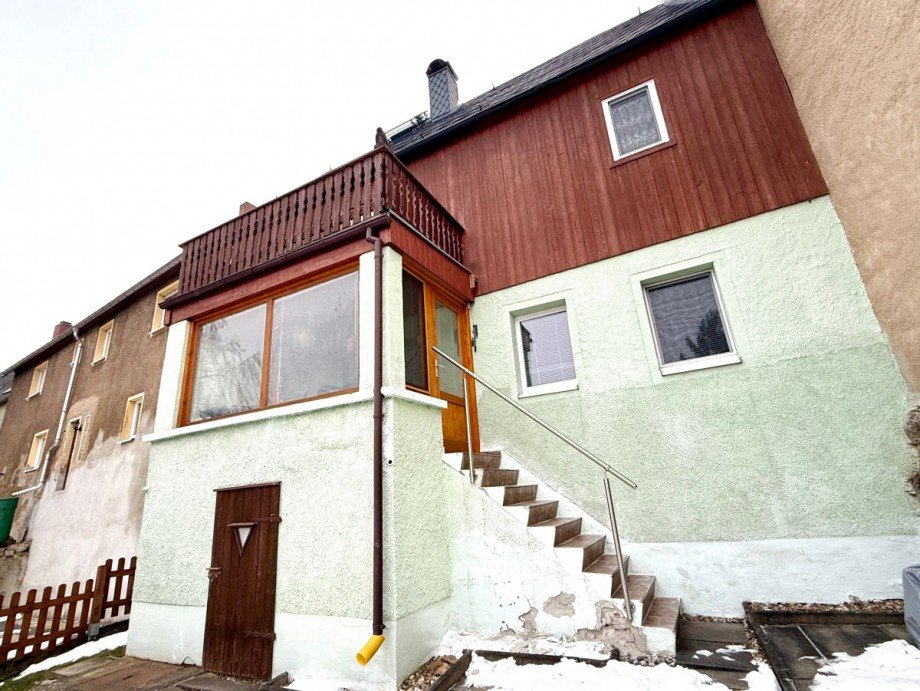 Geb�uder�ckseite mit Werkstatt Reihenmittelhaus Altenberg